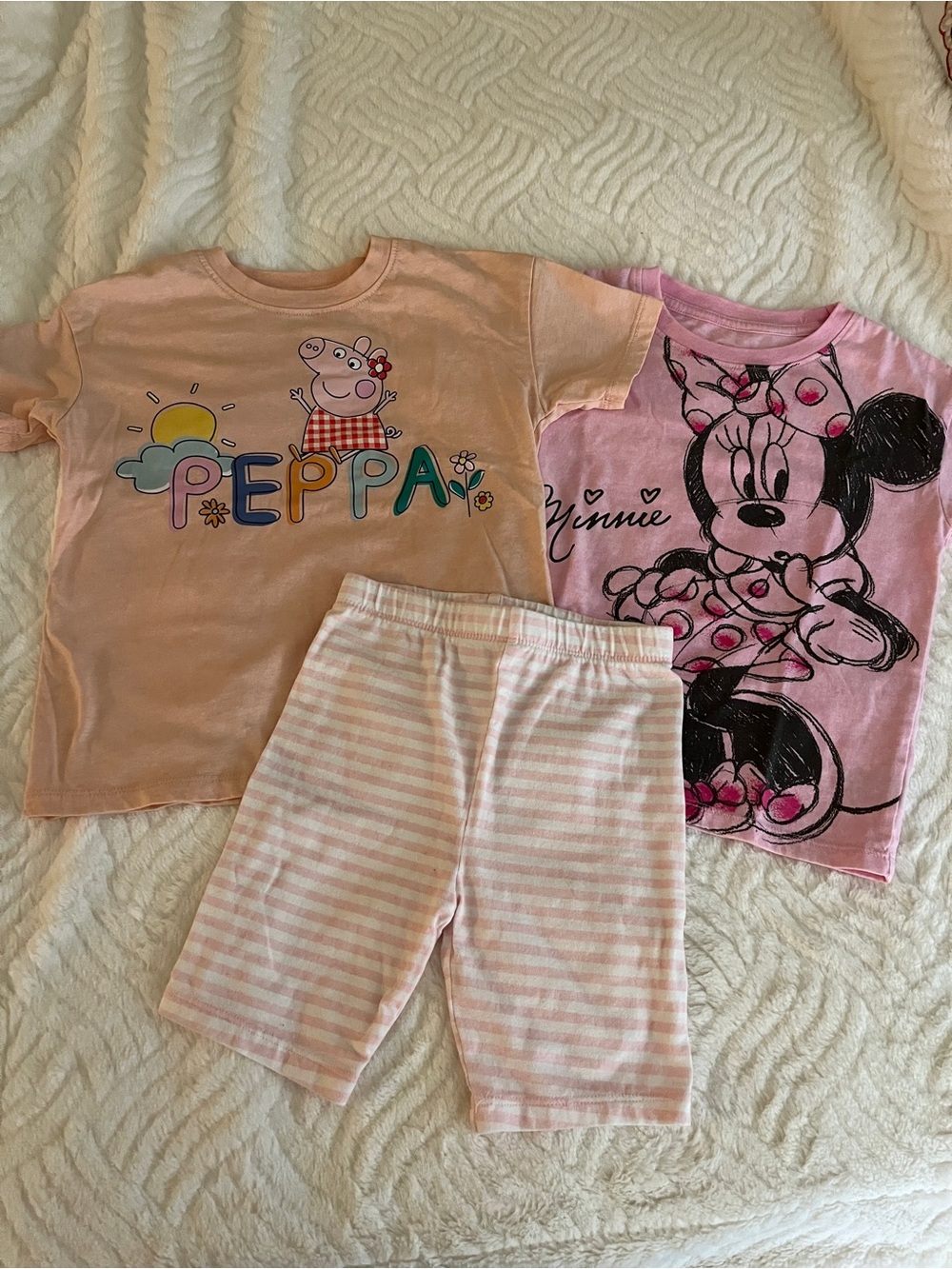 Peppa Pig Kids Minnie Mouse T-shirts with stripped pink and white shorts.